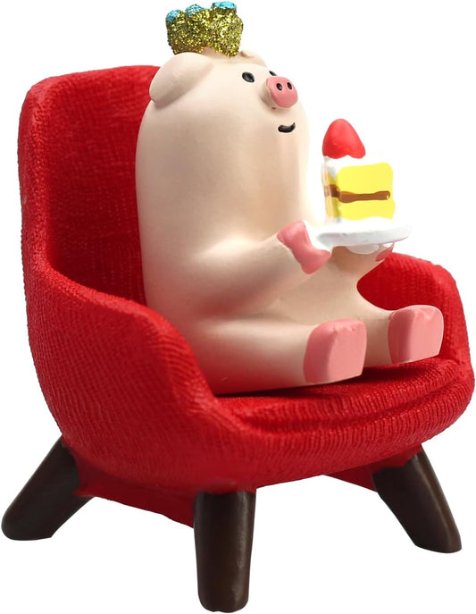 RAQWI Pig Eating Cake Figurine on Red Sofa, Mini Resin Desk Decor