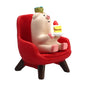 RAQWI Pig Eating Cake Figurine on Red Sofa, Mini Resin Desk Decor