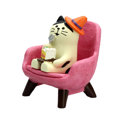 RAQWI Pig Eating Cake Figurine on Red Sofa, Mini Resin Desk Decor