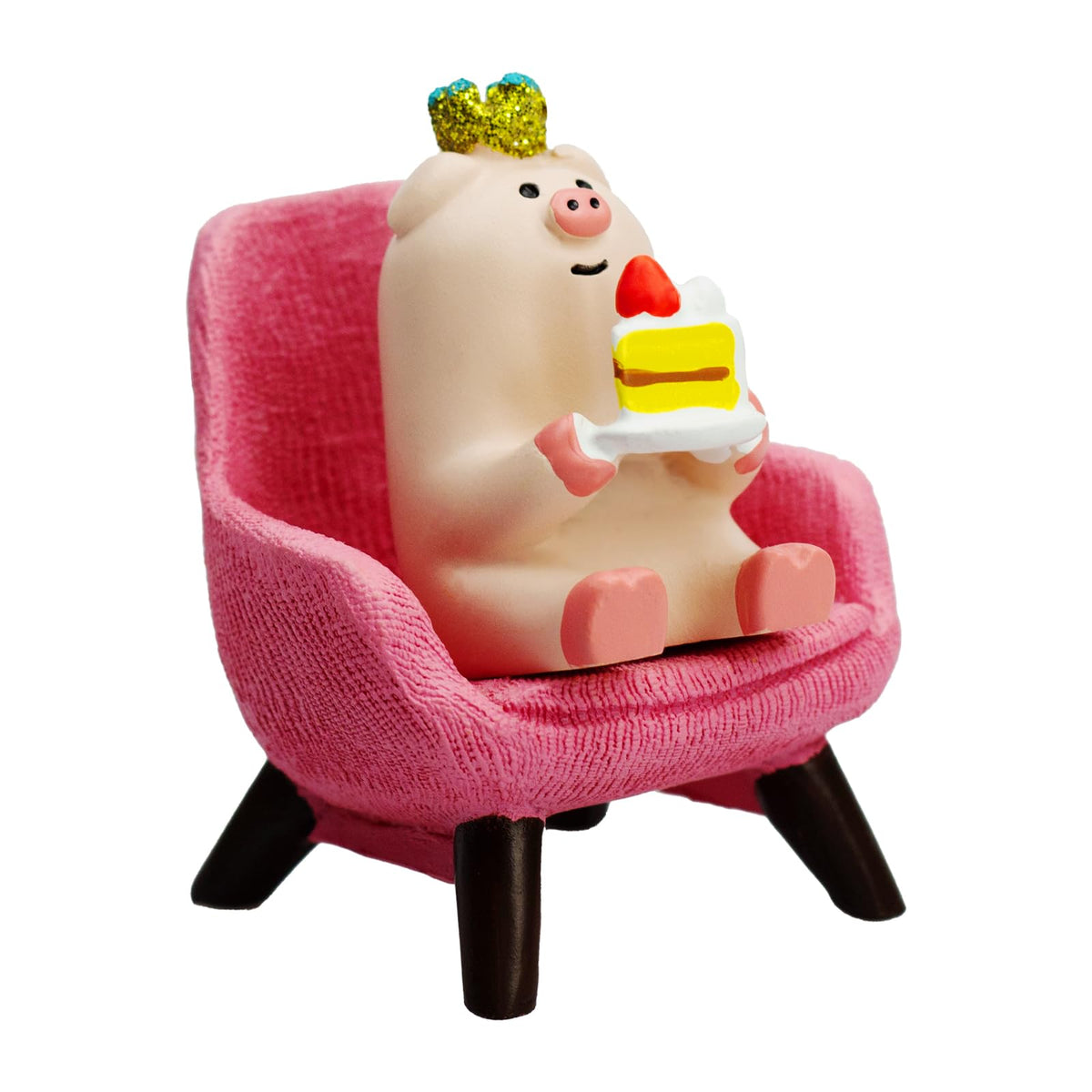 RAQWI Pig Eating Cake Figurine on Red Sofa, Mini Resin Desk Decor