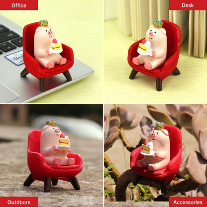 RAQWI Pig Eating Cake Figurine on Red Sofa, Mini Resin Desk Decor